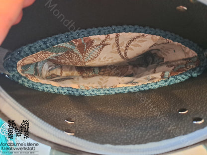 Liebevoll gehäkelte Tasche in Petrol