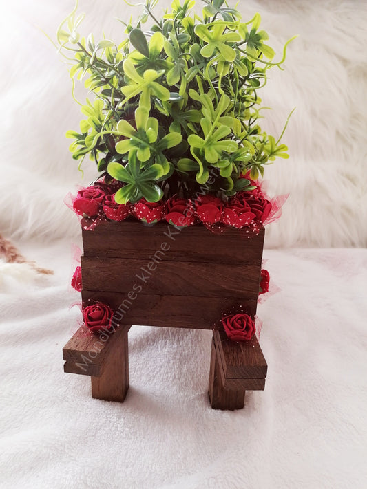 Schubkarre, befüllt mit Grünzeug